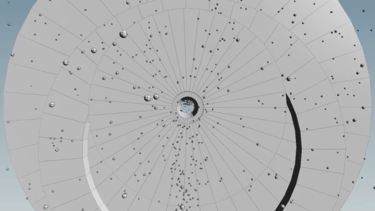 A screenshot from the game iyo, where you shoot colorful balls at each other and try to combine the ones with the same color