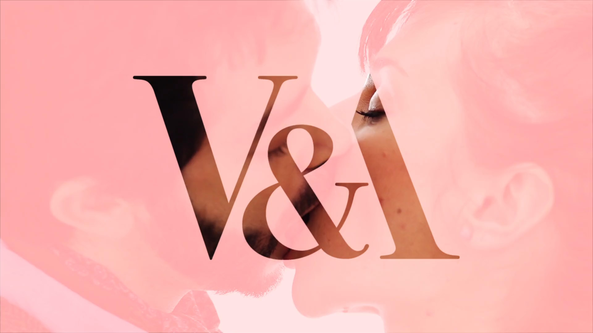 An animated gif of a couple kissing passionately, wit a pink treatment and with the V&A logo superimposed