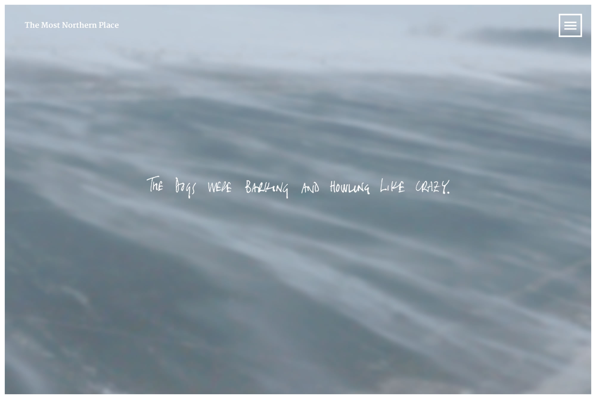 A screenshot showing snow being blown over a road, with handwritten words superimposed saying 'The dogs were barking and howling like crazy'