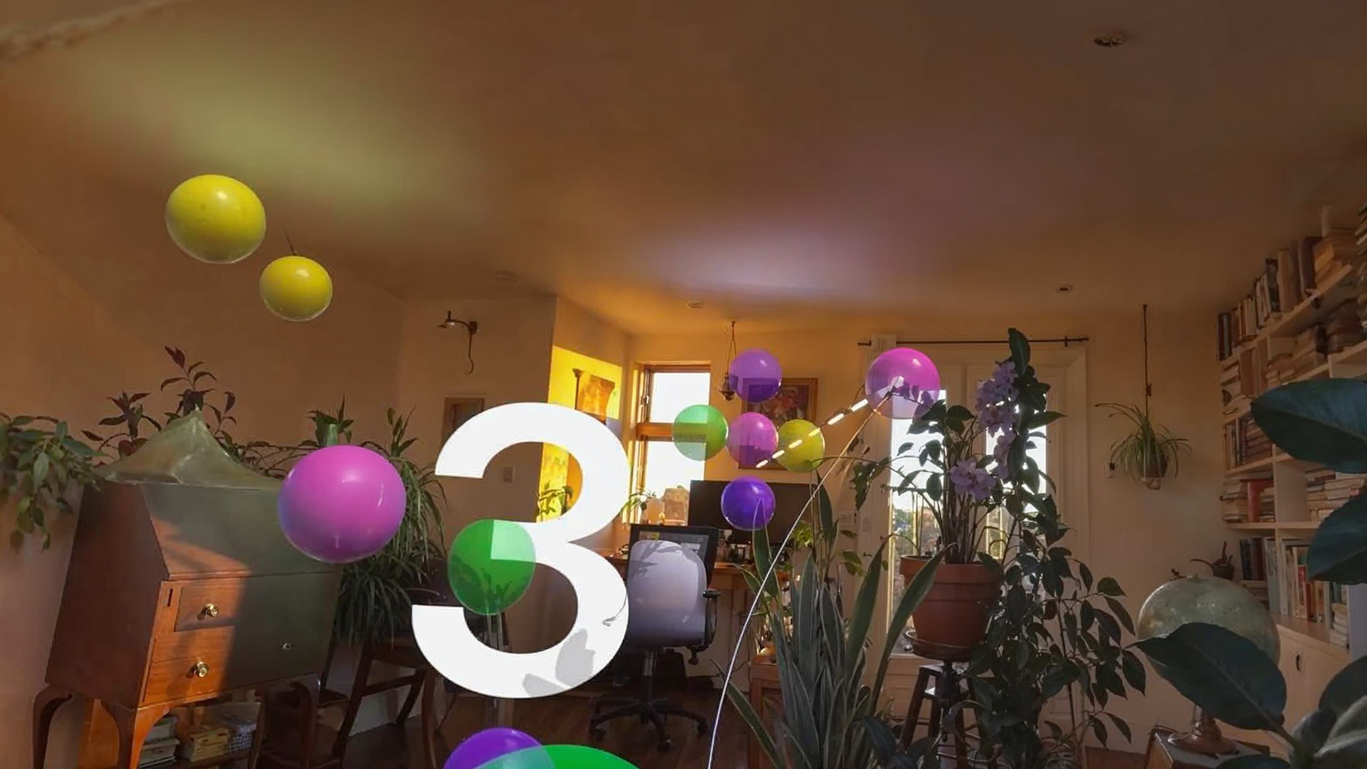Tonae glowing shapes floating in a living room environment on Apple Vision Pro